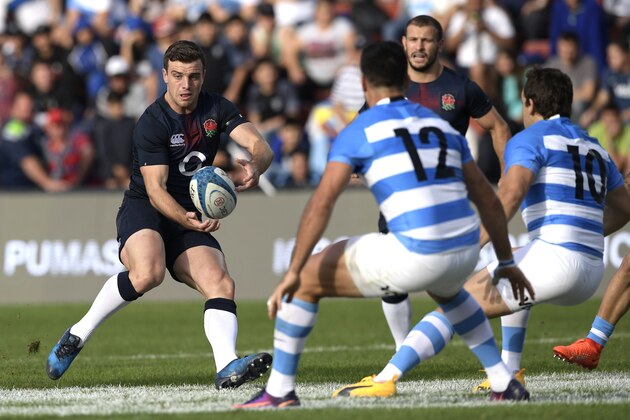 England's fly-half George Ford (L) passes the ball during the Rugby Union test match against Argentina's Los Pumas at Brigadier General Estanislao Lopez stadium in Santa Fe, Argentina on June 17, 2017. / AFP PHOTO / JUAN MABROMATA        (Photo credit should read JUAN MABROMATA/AFP/Getty Images)
