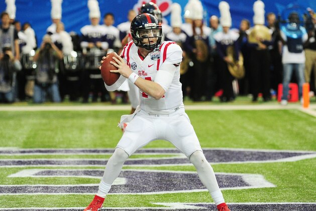 ATLANTA, GA - DECEMBER 31:  Bo Wallace #14 of the Ole Miss Rebels looks to pass against the TCU Horned Frogs in the fourth quarter during the Chik-fil-A Peach Bowl at Georgia Dome on December 31, 2014 in Atlanta, Georgia.  (Photo by Scott Cunningham/Getty Images)
