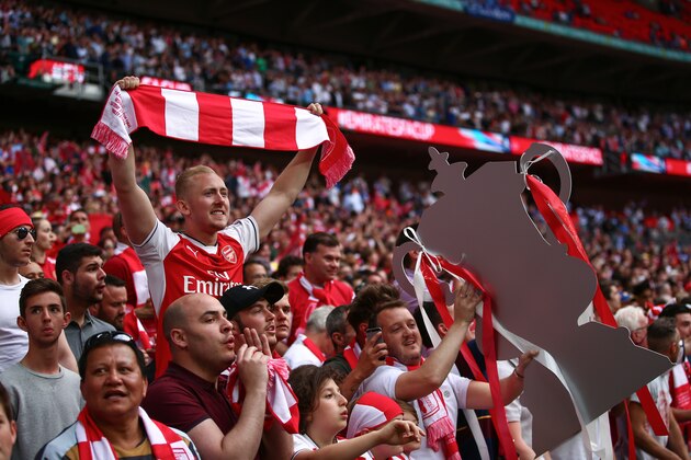 LONDON, ENGLAND - MAY 27:  Arsenal fans celebrate during the Emirates FA Cup Final match between Arsenal and Chelsea at Wembley Stadium on May 27, 2017 in London, England. (Photo by Robbie Jay Barratt - AMA/Getty Images)
