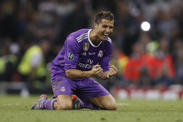 Real Madrid's Cristiano Ronaldo celebrates at the end of the Champions League final soccer match between Juventus and Real Madrid at the Millennium Stadium in Cardiff, Wales, Saturday June 3, 2017. Real Madrid won 4-1. (AP Photo/Kirsty Wigglesworth)