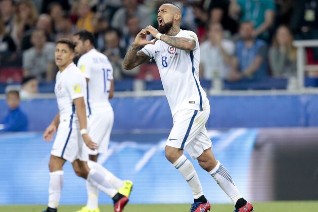 Chile's Arturo Vidal celebrates after scoring during the Confederations Cup, Group B soccer match between Cameroon and Chile, at the Spartak Stadium in Moscow, Sunday, June 18, 2017. (AP Photo/Ivan Sekretarev) Chile's Arturo Vidal celebrates after scoring during the Confederations Cup, Group B soccer match between Cameroon and Chile, at the Spartak Stadium in Moscow, Sunday, June 18, 2017. (AP Photo/Ivan Sekretarev)