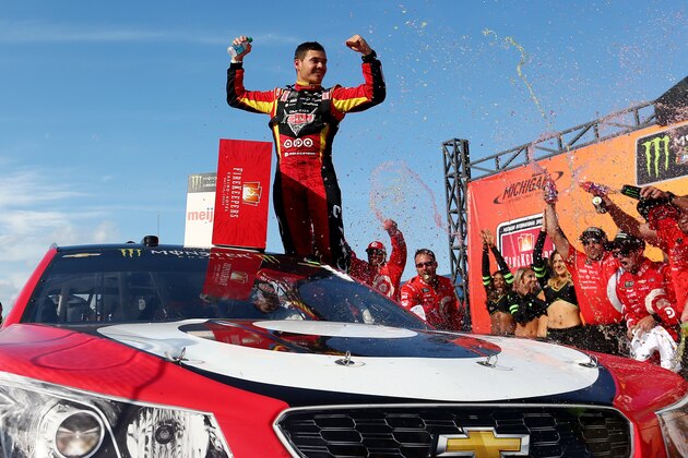 BROOKLYN, MI - JUNE 18:  Kyle Larson, driver of the #42 Cars 3/Target Chevrolet, celebrates in Victory Lane after winning the Monster Energy NASCAR Cup Series FireKeepers Casino 400 at Michigan International Speedway on June 18, 2017 in Brooklyn, Michigan.  (Photo by Sarah Crabill/Getty Images)