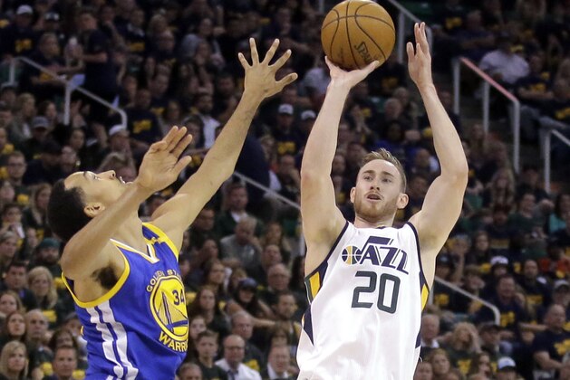 Utah Jazz forward Gordon Hayward (20) shoots as Golden State Warriors guard Shaun Livingston (34) defends in the second half during Game 3 of the NBA basketball second-round playoff series, Saturday, May 6, 2017, in Salt Lake City. Warriors won 102 - 91. (AP Photo/Rick Bowmer)