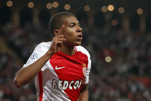 Monaco's forward Kylian MBappe Lottin celebrates his opening goal during the League One soccer match Monaco against Saint Etienne, at the Louis II stadium in Monaco, Wednesday, May 17, 2017. (AP Photo/Claude Paris)