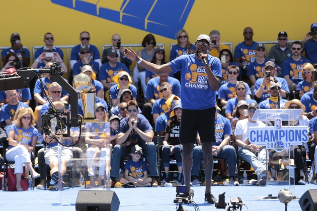 OAKLAND, CA - JUNE 15:  Kevin Durant #35 of the Golden State Warriors celebrates winning the 2017 NBA Championship during a parade on June 15, 2017 in Oakland, CA.  NOTE TO USER: User expressly acknowledges and agrees that, by downloading and/or using this Photograph, user is consenting to the terms and conditions of the Getty Images License Agreement. Mandatory Copyright Notice: Copyright 2017 NBAE (Photo by Jack Arent/NBAE via Getty Images)