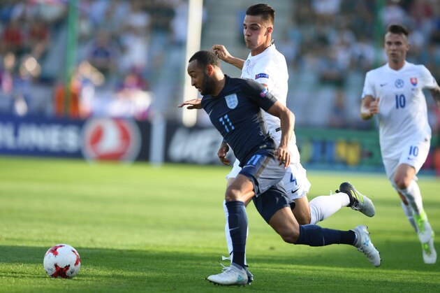 Slovakia's defender Martin Valjent (L) and England's midfielder Nathan Redmond vie for the ball during the UEFA U-21 European Championship Group A football match Slovakia v England in Kielce, Poland on June 19, 2017. / AFP PHOTO / PIOTR NOWAK        (Photo credit should read PIOTR NOWAK/AFP/Getty Images)
