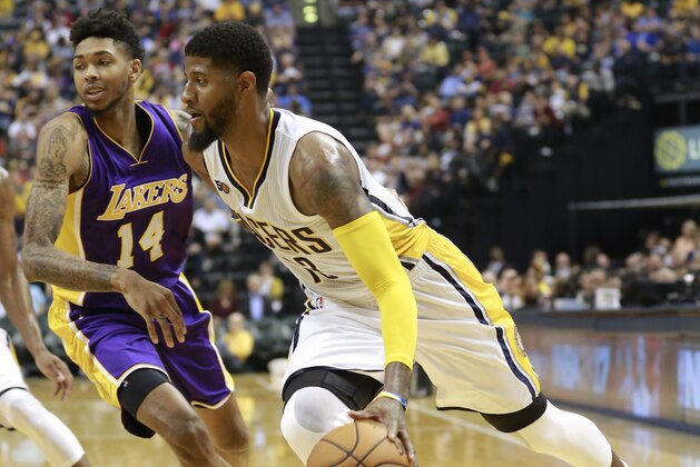 Indiana Pacers forward Paul George, right, drives around Los Angeles Lakers forward Brandon Ingram in the second half of an NBA basketball game, Tuesday, Nov. 1, 2016, in Indianapolis. Indiana won 115-108. (AP Photo/R Brent Smith)