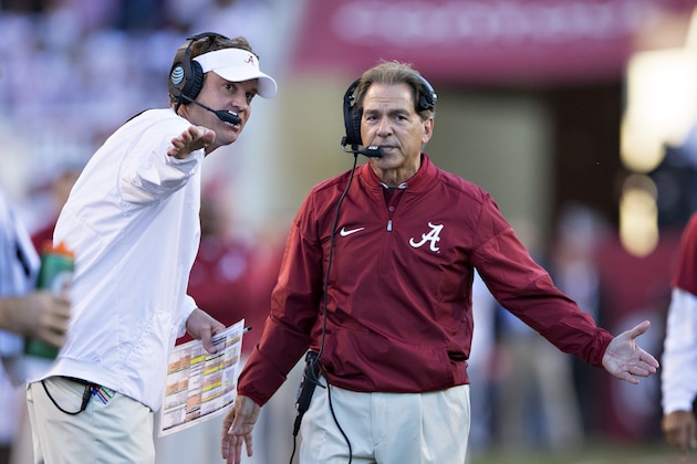 FAYETTEVILLE, AR - OCTOBER 8:  Head Coach Nick Saban and Offensive Coordinator Lane Kiffin of the Alabama Crimson Tide discuss a call during a game against the Arkansas Razorbacks at Razorback Stadium on October 8, 2016 in Fayetteville, Arkansas.  The Crimson Tide defeated the Razorbacks 49-30.  (Photo by Wesley Hitt/Getty Images)