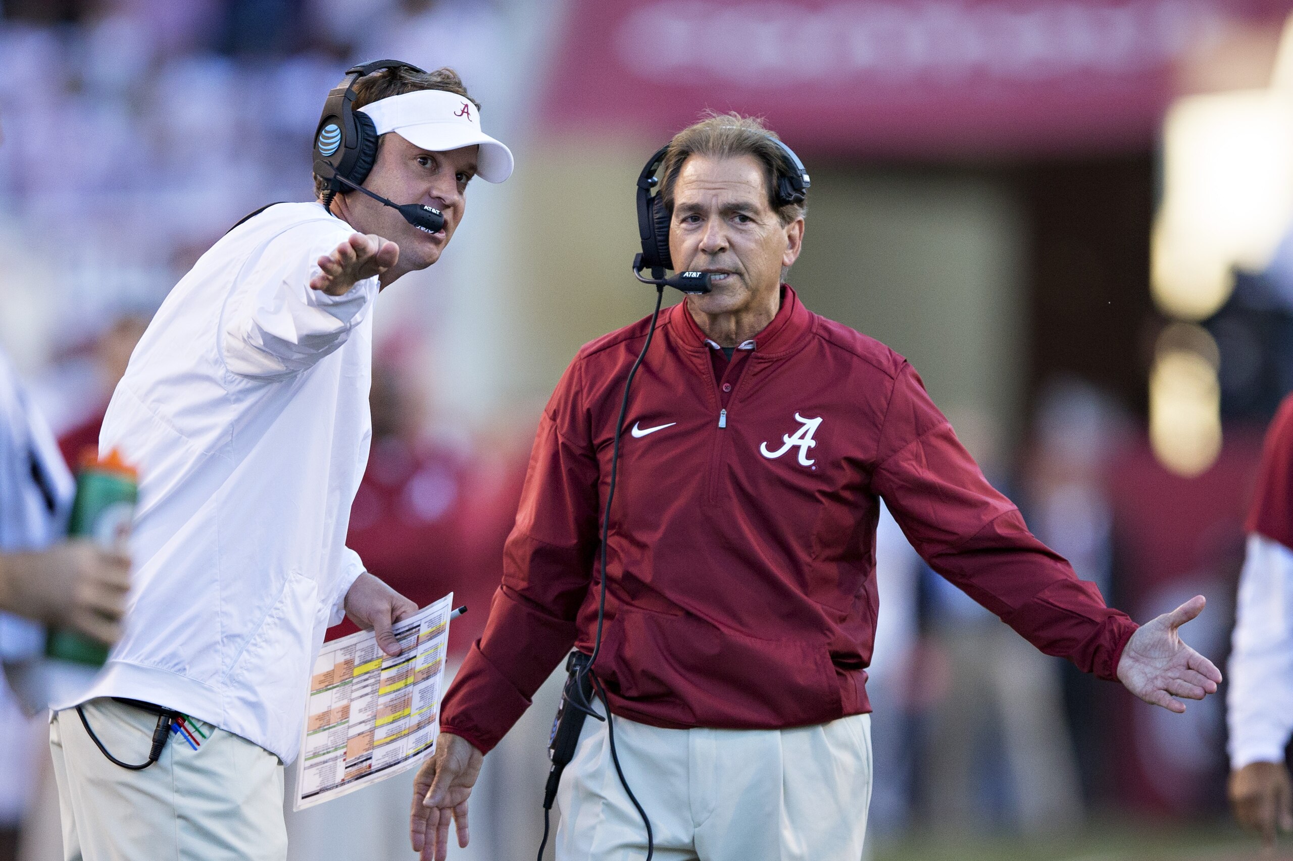 FAYETTEVILLE, AR - OCTOBER 8:  Head Coach Nick Saban and Offensive Coordinator Lane Kiffin of the Alabama Crimson Tide discuss a call during a game against the Arkansas Razorbacks at Razorback Stadium on October 8, 2016 in Fayetteville, Arkansas.  The Crimson Tide defeated the Razorbacks 49-30.  (Photo by Wesley Hitt/Getty Images)
