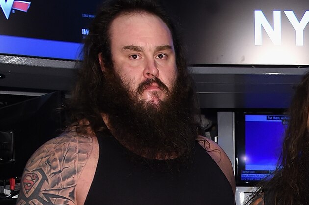 NEW YORK, NY - MARCH 29:  WWE Superstars Braun Strowman, Bray Wyatt and Erick Rowan ring The New York Stock Exchange Opening Bell in honor of WrestleMania 32  at New York Stock Exchange on March 29, 2016 in New York City.  (Photo by Jamie McCarthy/Getty Images)