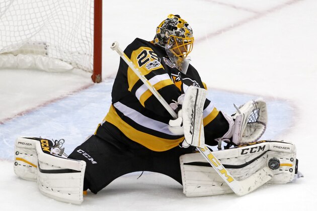 Pittsburgh Penguins goalie Marc-Andre Fleury makes save during the third period of Game 1 of the Eastern Conference final in the NHL Stanley Cup hockey playoffs against the Ottawa Senators in Pittsburgh, Saturday, May 13, 2017. (AP Photo/Gene J. Puskar)