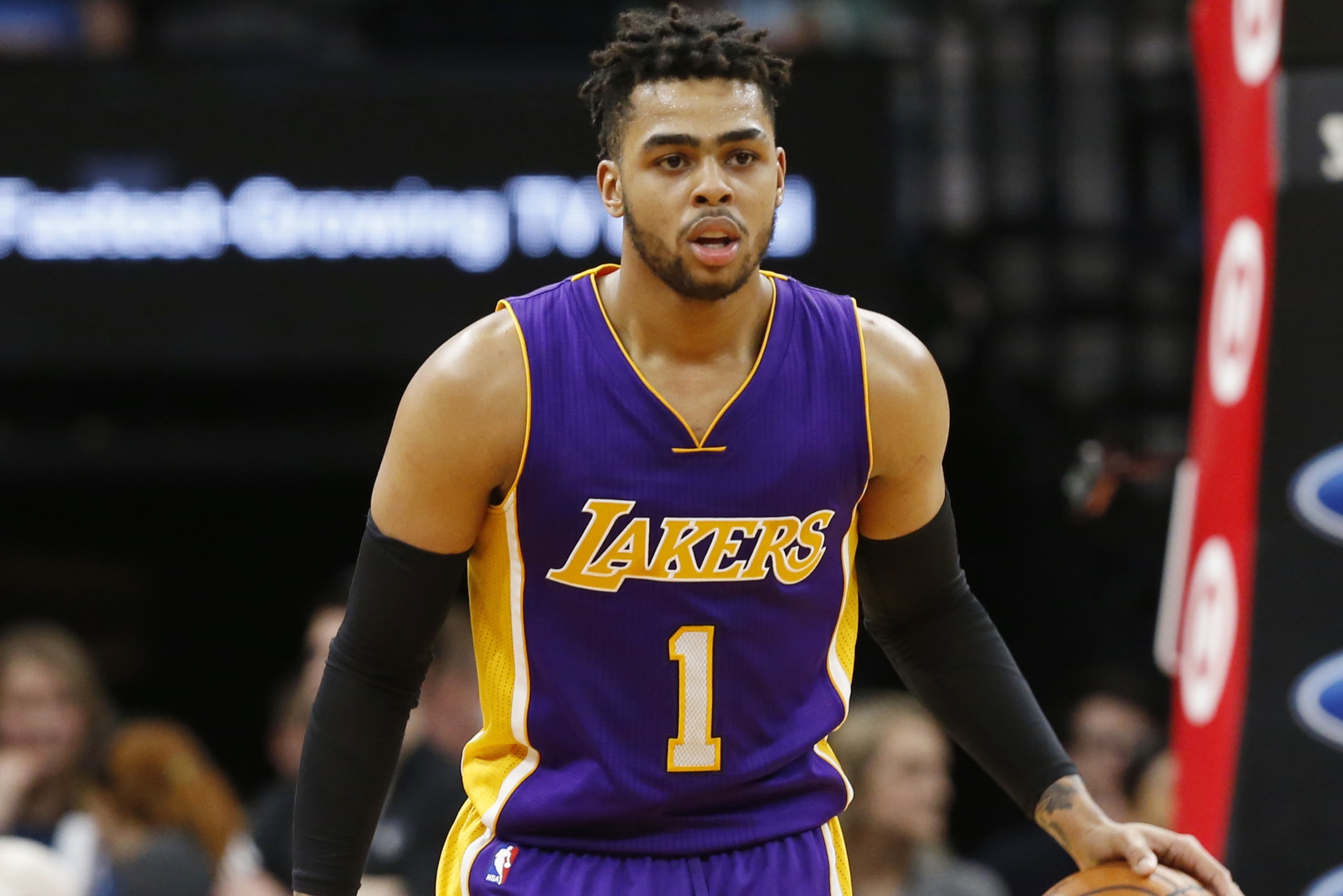 Los Angeles Lakers' D'Angelo Russell plays against the Minnesota Timberwolves during the first half of an NBA basketball game Thursday, March 30, 2017, in Minneapolis. (AP Photo/Jim Mone)