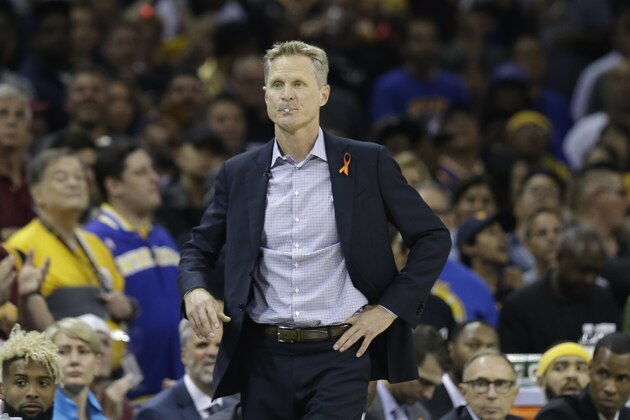 Golden State Warriors head coach Steve Kerr watches against the Cleveland Cavaliers in the first half of Game 4 of basketball's NBA Finals in Cleveland, Friday, June 9, 2017. (AP Photo/Tony Dejak)