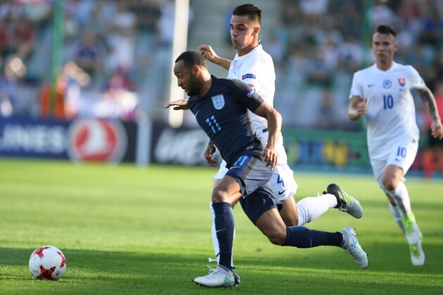 Slovakia's defender Martin Valjent (L) and England's midfielder Nathan Redmond vie for the ball during the UEFA U-21 European Championship Group A football match Slovakia v England in Kielce, Poland on June 19, 2017. / AFP PHOTO / PIOTR NOWAK        (Photo credit should read PIOTR NOWAK/AFP/Getty Images)