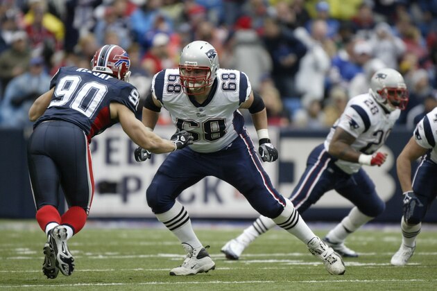 ORCHARD PARK, NY - OCTOBER 22:  Offensive lineman Ryan O'Callaghan #68 of the New England Patriots blocks against defensive lineman Chris Kelsay #90 of the Buffalo Bills at Ralph Wilson Stadium on October 22, 2006 in Orchard Park, New York. The Patriots defeated the Bills 28-6.  (Photo by George Gojkovich/Getty Images)