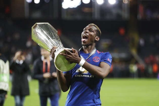 STOCKHOLM, SWEDEN - MAY 24: Paul Pogba of Manchester United with the trophy during the UEFA Europa League Final between Ajax and Manchester United  at Friends Arena on May 24, 2017 in Stockholm, Sweden.  (Photo by Nils Petter Nilsson/Getty Images)