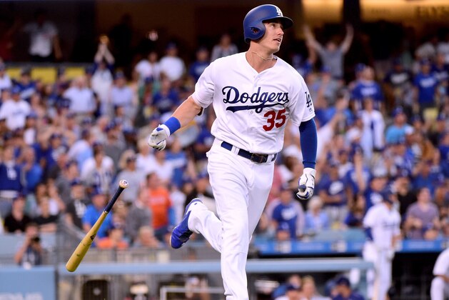 LOS ANGELES, CA - JUNE 19:  Cody Bellinger #35 of the Los Angeles Dodgers reacts to his solo homerun, his second homerun of the game, to take a 7-0 lead over the New York Mets during the second inning at Dodger Stadium on June 19, 2017 in Los Angeles, California.  (Photo by Harry How/Getty Images)