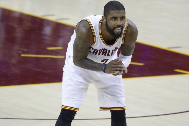Cleveland Cavaliers guard Kyrie Irving reacts during play against the Golden State Warriors during the first half of Game 4 of basketball's NBA Finals in Cleveland, Friday, June 9, 2017. (AP Photo/Ron Schwane)
