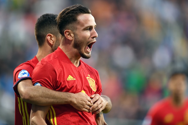 Spain's midfielder Saul Niguez (R) celebrates scoring the opening goal with his teaammates during the UEFA U-21 European Championship Group B football match Spain v FYR Macedonia on June 17, 2017 in Gdynia, Poland. / AFP PHOTO / Maciej GILLERT        (Photo credit should read MACIEJ GILLERT/AFP/Getty Images)