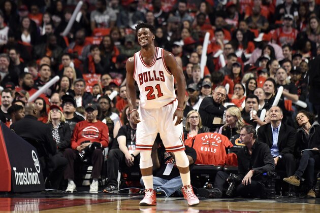 Chicago Bulls forward Jimmy Butler smiles during the first half of the team's NBA basketball game against the Brooklyn Nets in Chicago, Wednesday, April 12, 2017. (AP Photo/David Banks)