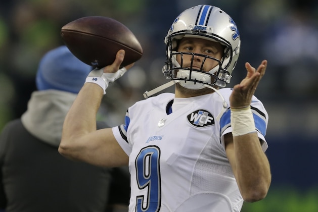 Detroit Lions quarterback Matthew Stafford wears a brace on his finger as he passes during warmups before an NFL football NFC wild card playoff game against the Seattle Seahawks, Saturday, Jan. 7, 2017, in Seattle. (AP Photo/Stephen Brashear)