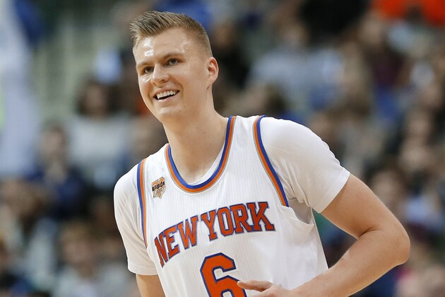 New York Knicks' Kristaps Porzingis (6) of Latvia jogs up court smiling during an NBA basketball game against the Dallas Mavericks on Wednesday, Jan. 25, 2017, in Dallas. (AP Photo/Tony Gutierrez)