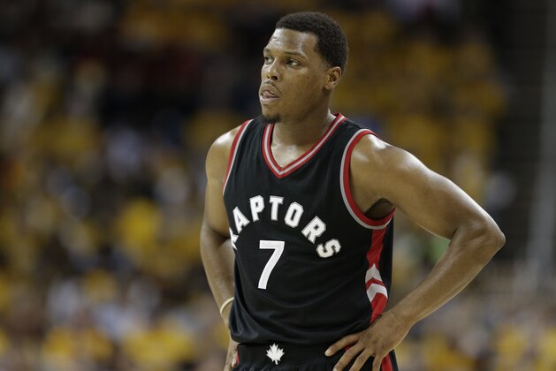 Toronto Raptors' Kyle Lowry looks on in the second half in Game 1 of a second-round NBA basketball playoff series against the Cleveland Cavaliers, Monday, May 1, 2017, in Cleveland. The Cavaliers won 116-105. (AP Photo/Tony Dejak)