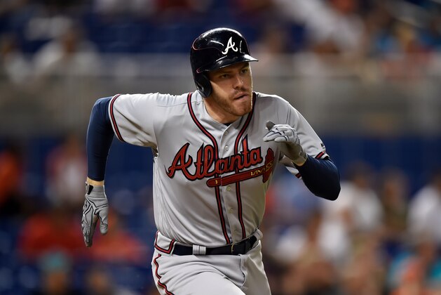 May 12, 2017; Miami, FL, USA; Atlanta Braves first baseman Freddie Freeman (5) connects for a double in the eighth inning against the Miami Marlins at Marlins Park. Mandatory Credit: Steve Mitchell-USA TODAY Sports