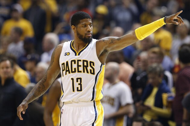 Apr 23, 2017; Indianapolis, IN, USA; Indiana Pacers forward Paul George (13) points during a game against the Cleveland Cavaliers in game four of the first round of the 2017 NBA Playoffs at Bankers Life Fieldhouse. Cleveland defeats Indiana 106-102. Mandatory Credit: Brian Spurlock-USA TODAY Sports