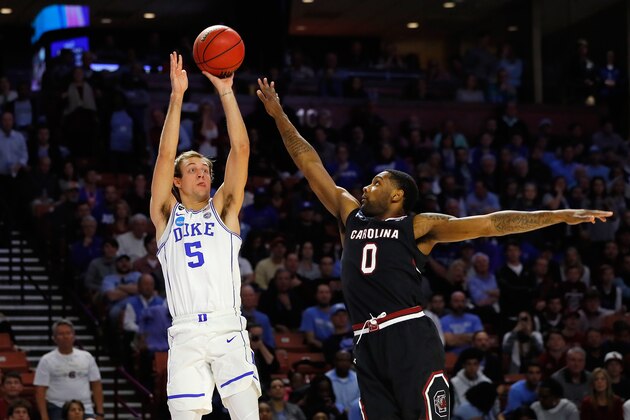 GREENVILLE, SC - MARCH 19:  Luke Kennard #5 of the Duke Blue Devils shoots the ball against Sindarius Thornwell #0 of the South Carolina Gamecocks in the first half during the second round of the 2017 NCAA Men's Basketball Tournament at Bon Secours Wellness Arena on March 19, 2017 in Greenville, South Carolina.  (Photo by Kevin C. Cox/Getty Images)