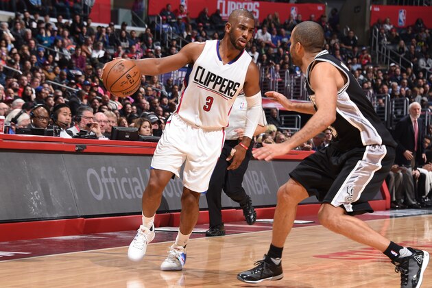 LOS ANGELES, CA - DECEMBER 22: Chris Paul #3 of the Los Angeles Clippers handles the ball during the game against the San Antonio Spurs on December 22, 2016 at STAPLES Center in Los Angeles, California. NOTE TO USER: User expressly acknowledges and agrees that, by downloading and/or using this Photograph, user is consenting to the terms and conditions of the Getty Images License Agreement. Mandatory Copyright Notice: Copyright 2016 NBAE (Photo by Andrew D. Bernstein/NBAE via Getty Images)