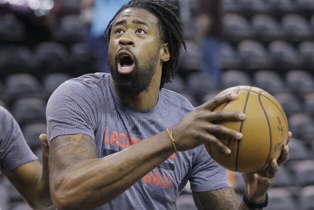 LA Clippers center DeAndre Jordan shoots during practice before the start of their NBA basketball game against the Utah Jazz Monday, March 13, 2017, in Salt Lake City. (AP Photo/Rick Bowmer)