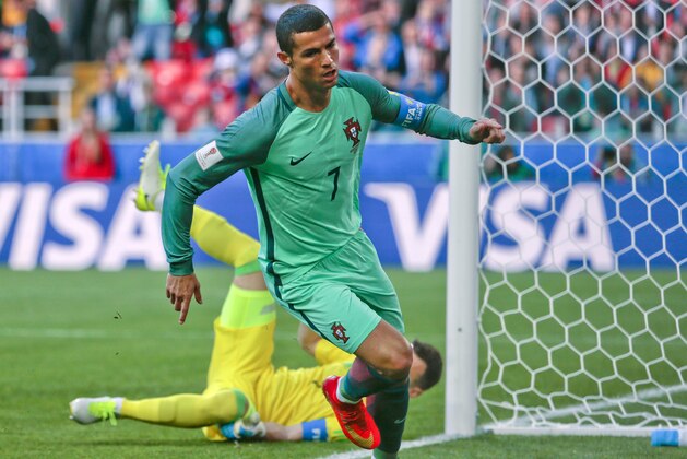 Portugal's Cristiano Ronaldo celebrates after scoring his side's first goal during the Confederations Cup, Group A soccer match between Russia and Portugal, at the Spartak Stadium in Moscow, Wednesday, June 21, 2017. (AP Photo/Ivan Sekretarev)