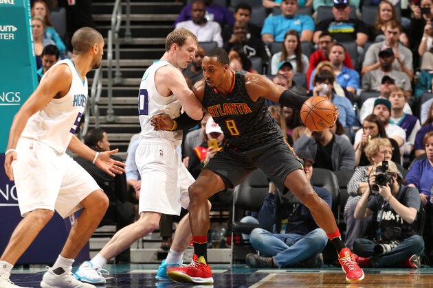 CHARLOTTE, NC - MARCH 20:  Dwight Howard #8 of the Atlanta Hawks handles the ball during a game against the Charlotte Hornets on March 20, 2017 at Spectrum Center in Charlotte, North Carolina. NOTE TO USER: User expressly acknowledges and agrees that, by downloading and/or using this photograph, user is consenting to the terms and conditions of the Getty Images License Agreement. Mandatory Copyright Notice: Copyright 2017 NBAE (Photo by Kent Smith/NBAE via Getty Images)