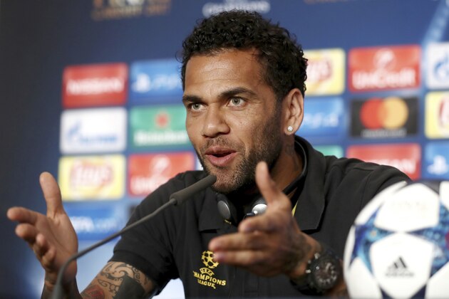 Juventus' Dani Alves speaks during a press conference at the Millennium Stadium in Cardiff, Wales, Friday June 2, 2017. Real Madrid will play Juventus in the final of the Champions League soccer match in Cardiff on Saturday. (UEFA Pool via AP)
