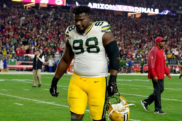 GLENDALE, AZ - JANUARY 16:  Defensive end Letroy Guion #98 of the Green Bay Packers walks off the field after losing in overtime to the Arizona Cardinals 26-20  in the NFC Divisional Playoff Game at University of Phoenix Stadium on January 16, 2016 in Glendale, Arizona.  (Photo by Jennifer Stewart/Getty Images)