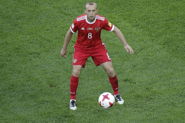 Russia's Denis Glushakov eyes the ball during the Confederations, Cup Group A soccer match between Russia and New Zealand, at the St.Petersburg stadium in St.Petersburg, Russia, Saturday, June 17, 2017. (AP Photo/Dmitri Lovetsky)