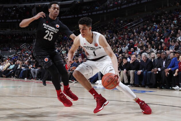 Mar 29, 2017; Chicago, IL, USA; McDonalds All-American West forward Michael Porter Jr. (1) drives to the basket against East forward PJ Washington Jr (25) during the 40th Annual McDonald's High School All-American Game at the United Center. Mandatory Credit: Brian Spurlock-USA TODAY Sports