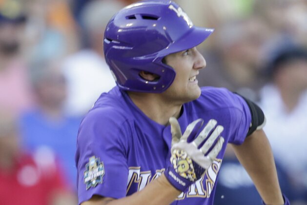 LSU's Jake Slaughter watches his three-run home run during the second inning of the team's NCAA College World Series baseball game against Florida State in Omaha, Neb., Wednesday, June 21, 2017. (AP Photo/Nati Harnik)