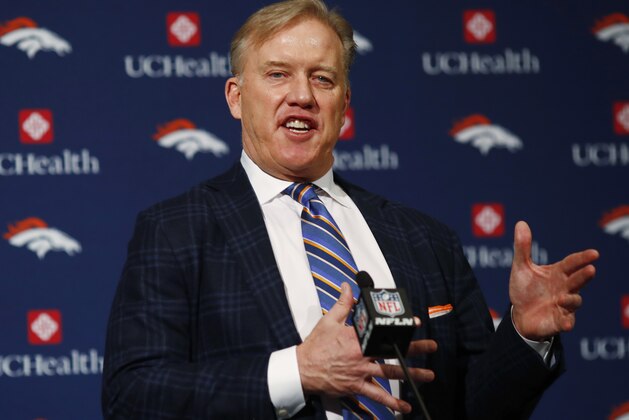 FILE - In this Jan. 12, 2017,  file photo, Denver Broncos general manager John Elway responds to questions after the introduction of Vance Joseph as the new head coach of the NFL football team during a news conference at the team's headquarters. A Washington, D.C. cab driver got the surprise of a lifetime Friday, Jan. 20, 2017, after mentioning to a group of passengers that John Elway was his all-time favorite quarterback and then learning that Elway himself was riding in the backseat. (AP Photo/David Zalubowski, File)