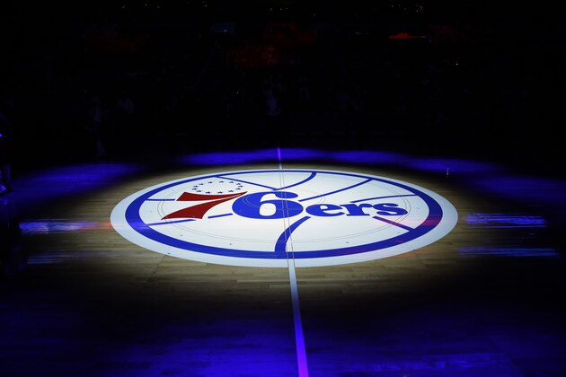 The Philadelphia 76ers' lhalf-court logo is shown before an NBA basketball game against the Cleveland Cavaliers, Friday, Nov. 8, 2013, in Philadelphia. (AP Photo/Matt Slocum)