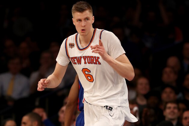 NEW YORK, NY - MARCH 27:  Kristaps Porzingis #6 of the New York Knicks celebrates his basket in the first quarter against the Detroit Pistons at Madison Square Garden on March 27, 2017 in New York City. NOTE TO USER: User expressly acknowledges and agrees that, by downloading and or using this Photograph, user is consenting to the terms and conditions of the Getty Images License Agreement  (Photo by Elsa/Getty Images)