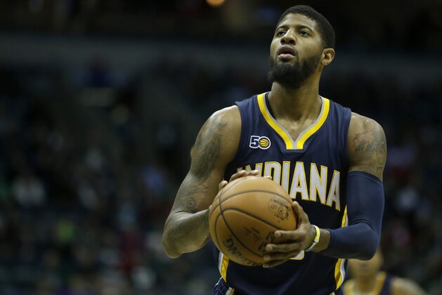 Indiana Pacers' Paul George shoots a free throw during the first half of an NBA basketball game against the Milwaukee Bucks Friday, March 10, 2017, in Milwaukee. (AP Photo/Aaron Gash)