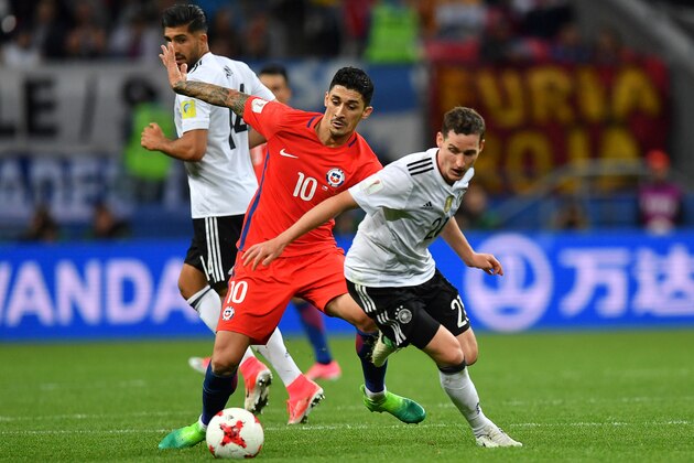 Germany's midfielder Sebastian Rudy (R) vies with Chile's midfielder Pablo Hernandez during the 2017 Confederations Cup group B football match between Germany and Chile at the Kazan Arena Stadium in Kazan on June 22, 2017. / AFP PHOTO / Yuri CORTEZ        (Photo credit should read YURI CORTEZ/AFP/Getty Images)