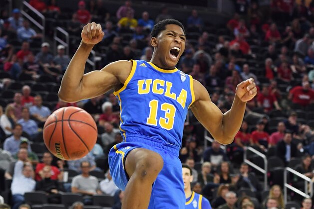 LAS VEGAS, NV - MARCH 10:  Ike Anigbogu #13 of the UCLA Bruins reacts after dunking against the Arizona Wildcats during a semifinal game of the Pac-12 Basketball Tournament at T-Mobile Arena on March 10, 2017 in Las Vegas, Nevada. Arizona won 86-75.  (Photo by Ethan Miller/Getty Images)