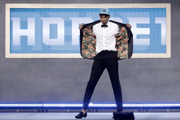 Kentucky's Malik Monk reacts after being selected by the Charlotte Hornets as the 11th pick overall during the NBA basketball draft, Thursday, June 22, 2017, in New York. (AP Photo/Frank Franklin II)