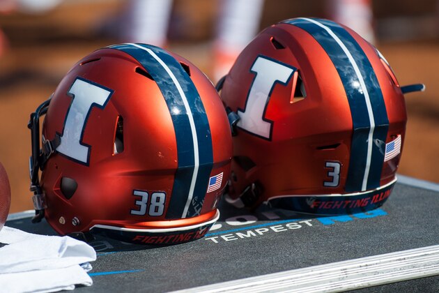 A pair of Illinois helmets sits on an equipment box during an NCAA college football game against Murray State, Saturday, Sept. 3, 2016 at Memorial Stadium in Champaign, Ill.  Illinois defeated Murray St. 52-3.  (AP Photo/Bradley Leeb)