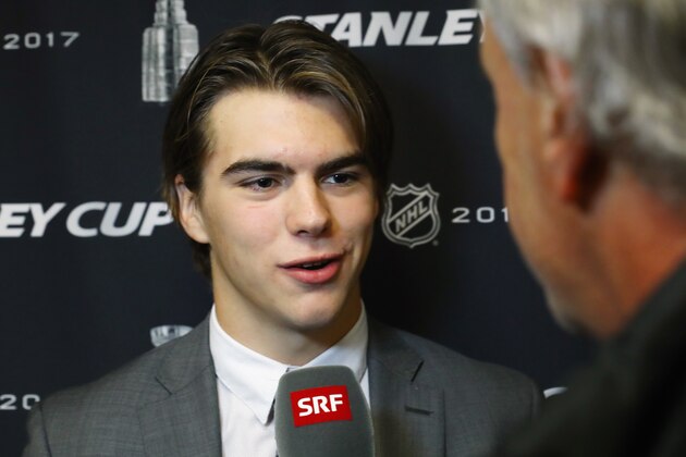 NASHVILLE, TN - JUNE 05:  Nico Hischier is interviewed during media availability for 2017 NHL draft prospects prior to Game Four of the 2017 NHL Stanley Cup Final at the Bridgestone Arena on June 5, 2017 in Nashville, Tennessee.  (Photo by Bruce Bennett/Getty Images)