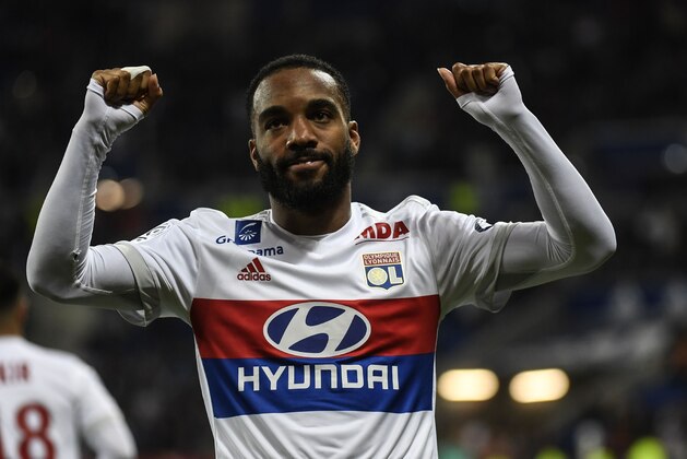 Lyon's French forward Alexandre Lacazette reacts after scoring during the French L1 football match between Lyon (OL) and Nice (OGCN) on May 20, 2017, at the Parc Olympique Lyonnais stadium in Decines-Charpieu near Lyon, central-eastern  France. / AFP PHOTO / PHILIPPE DESMAZES        (Photo credit should read PHILIPPE DESMAZES/AFP/Getty Images)