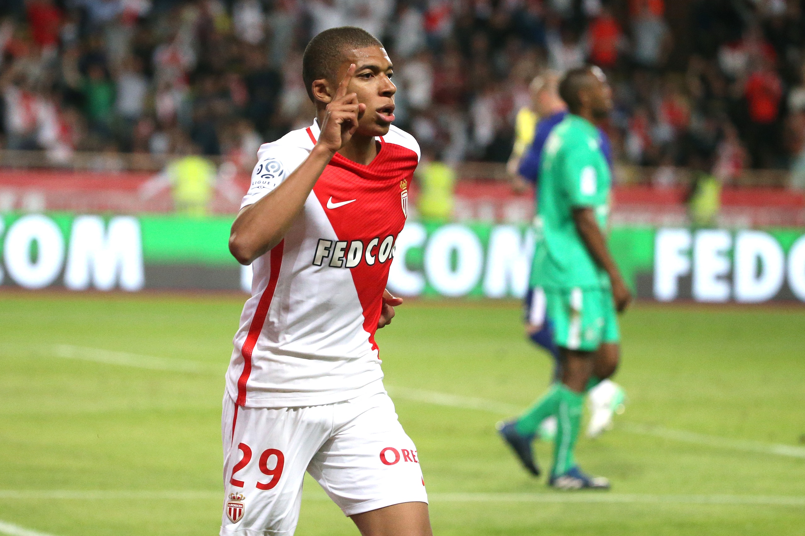 MONACO, MONACO - MAY 17: Kylian Mbappe of Monaco celebrates scoring a goal during the French Ligue 1 match between AS Monaco and AS Saint-Etienne (ASSE) at Stade Louis II on May 17, 2017 in Monaco, Monaco. (Photo by Jean Catuffe/Getty Images)